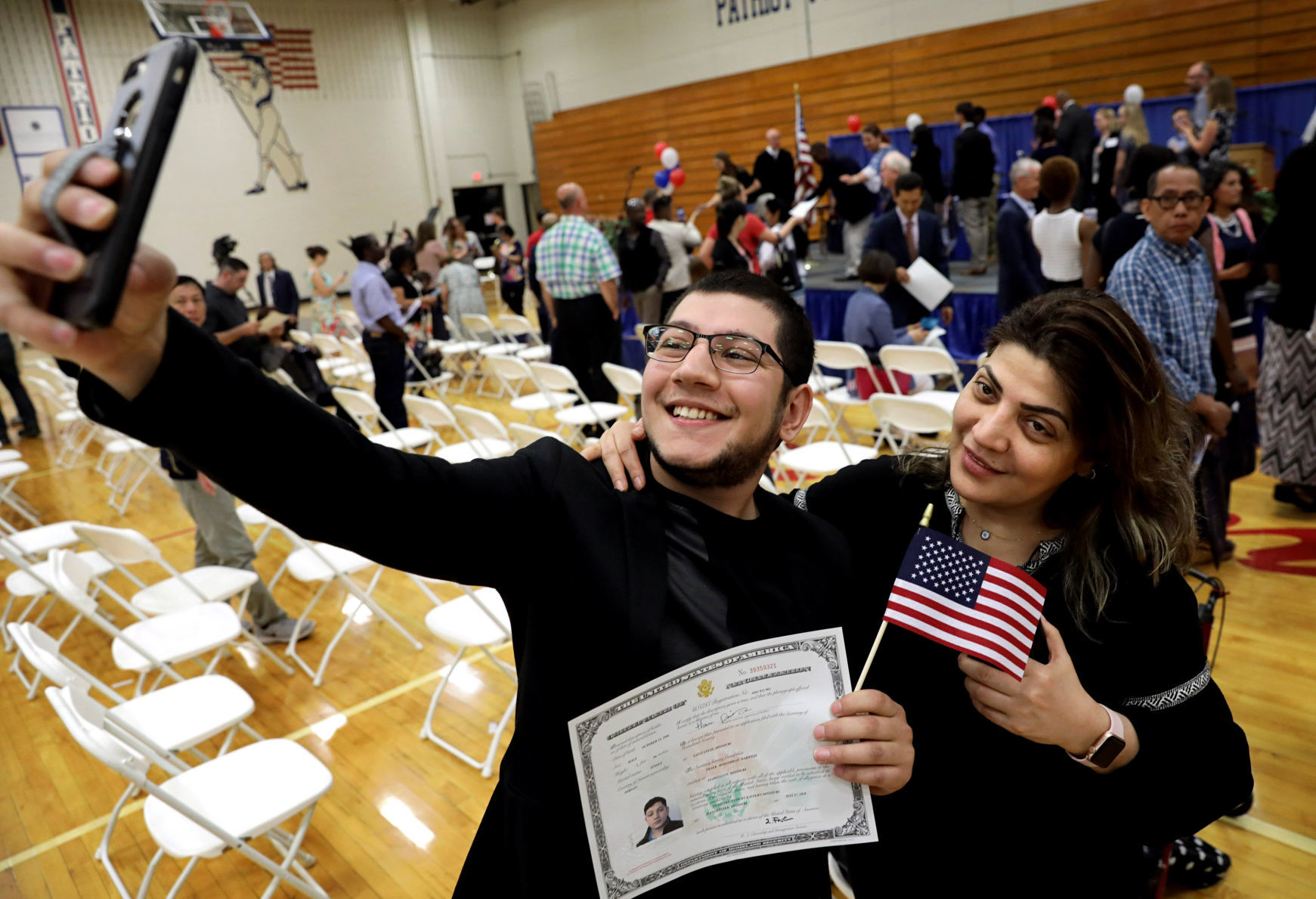 49 people become citizens of the United States during Naturalization ceremony at Parkway South High School